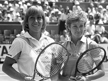 Martina Navratilova and Chris Evert, Standing on a Tennis Court.